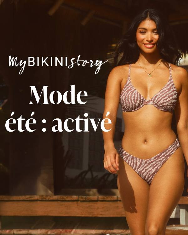Femme &agrave; l'ext&eacute;rieur portant un ensemble bikini brun et blanc au motif &agrave; z&eacute;brures florales de la marque My Bikini Story.