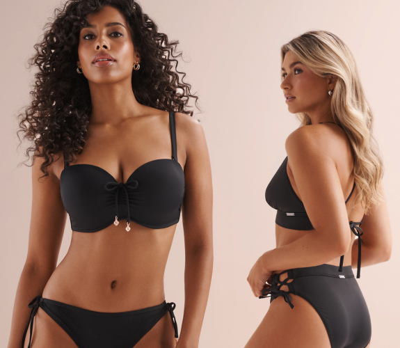 Two women wearing black bikini sets from the Made to Mix Collection.