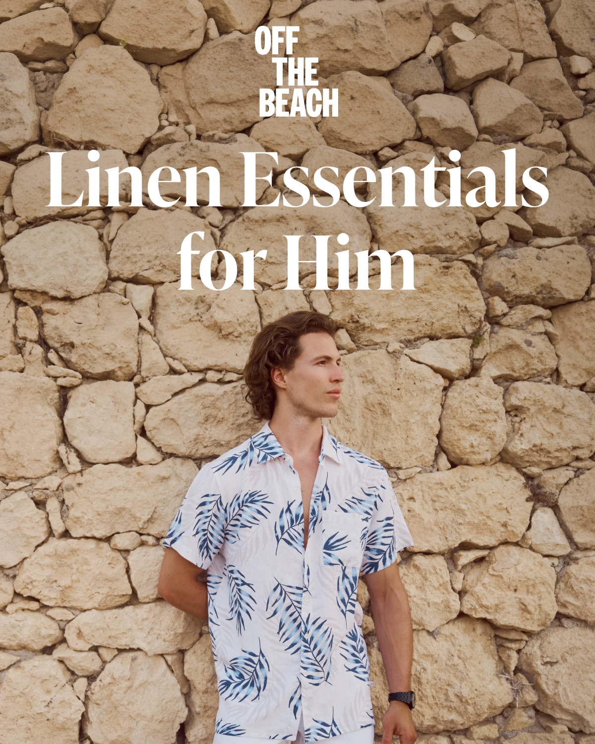 A man standing against a rock wall, wearing an Off The Beach linen outfit.	