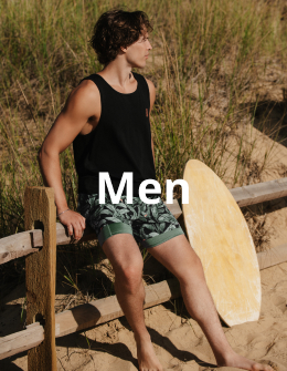 Man wearing a black camisole and swim shorts from Hamabe.