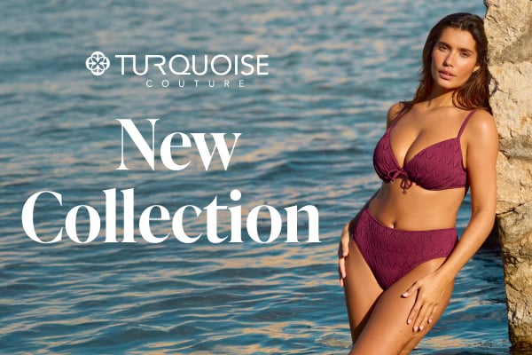 A woman wearing a deep plum bikini from Turquoise Couture, standing confidently in a stylish swimwear look