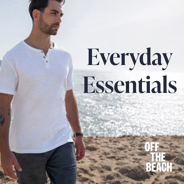 Men on the beach wearing a white T‑shirt and a linen shirt‑and‑pants set from Off The Beach. 