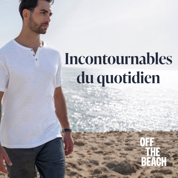 Homme sur la plage portant un t-shirt blanc et un ensemble chemise et pantalon en lin de la marque Off The Beach. 