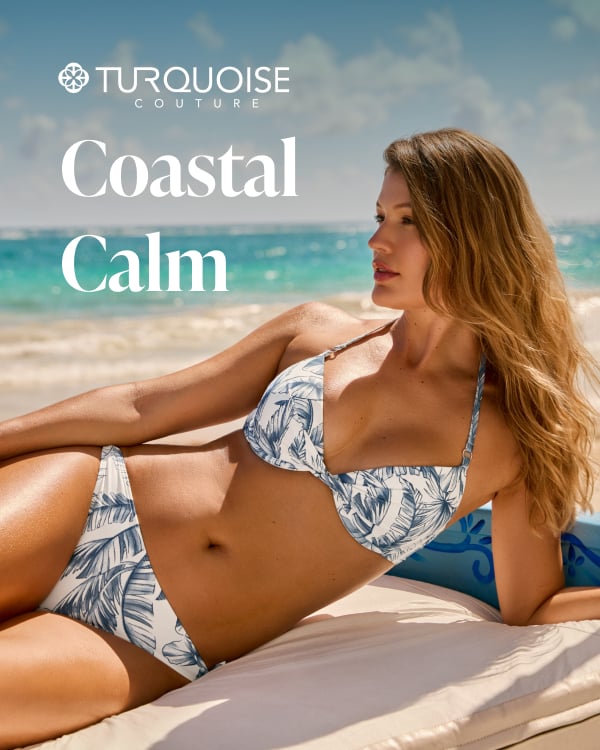 Woman walking on the beach and wearing an exotic patterned bikini set from Turquoise Couture