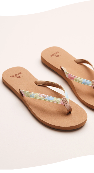 Pair of floral strap sandals by Rip Curl.