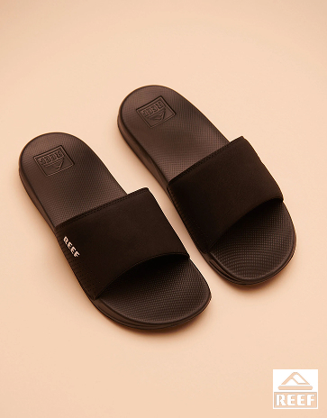 Pair of black men’s sandals from Reef.