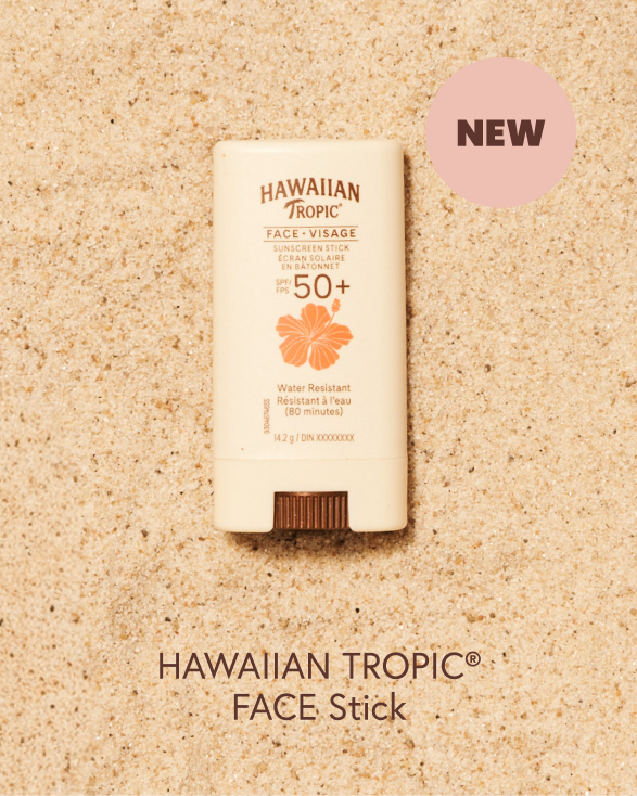 Hawaiian Tropic SPF 30 sunscreen on the sand