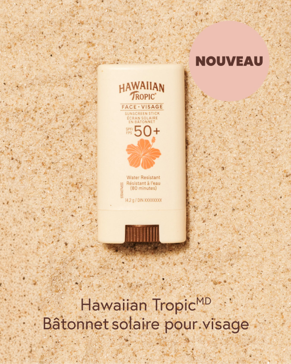 Écran solaire FPS 30 d’Hawaiian Tropic sur le sable