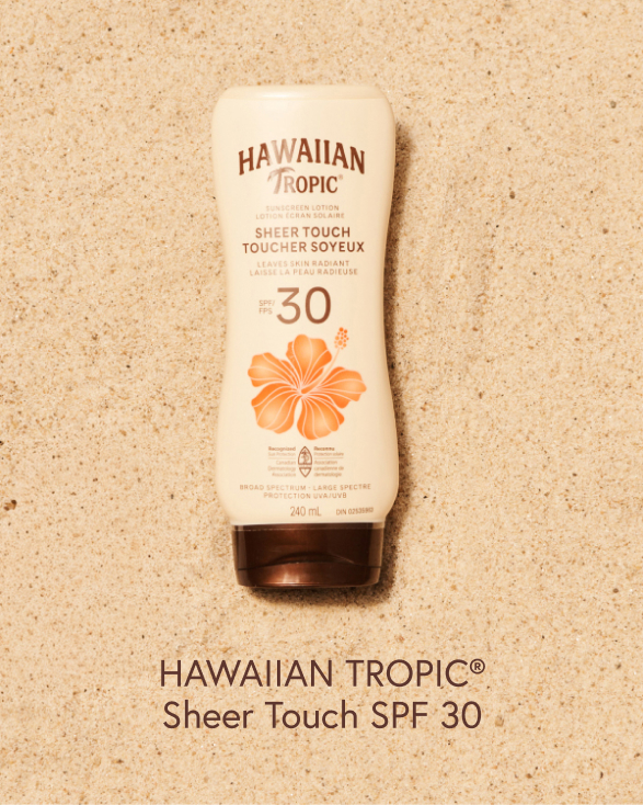 Hawaiian Tropic SPF 30 sunscreen on the sand