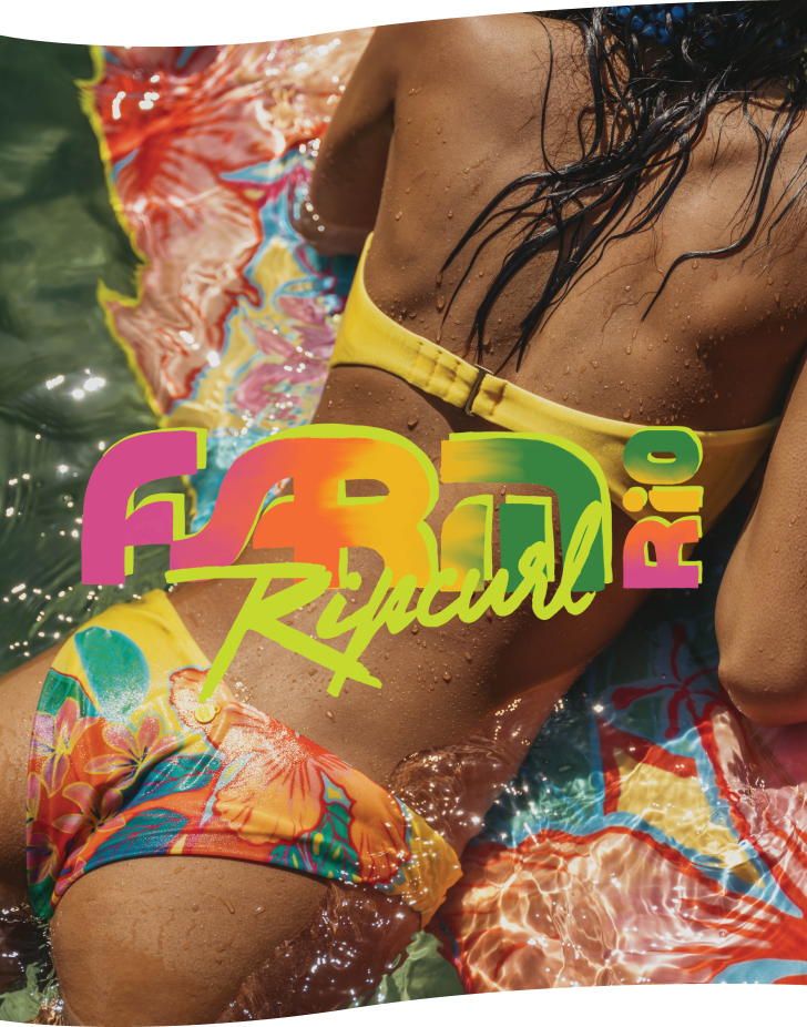 Woman on a surfboard wearing a colourful bikini from the Rip Curl x FARM Rio collaboration.