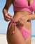 TROPIK Bas de bikini brésilien noué aux hanches ratiné Rose éclatant 01300295 - View1